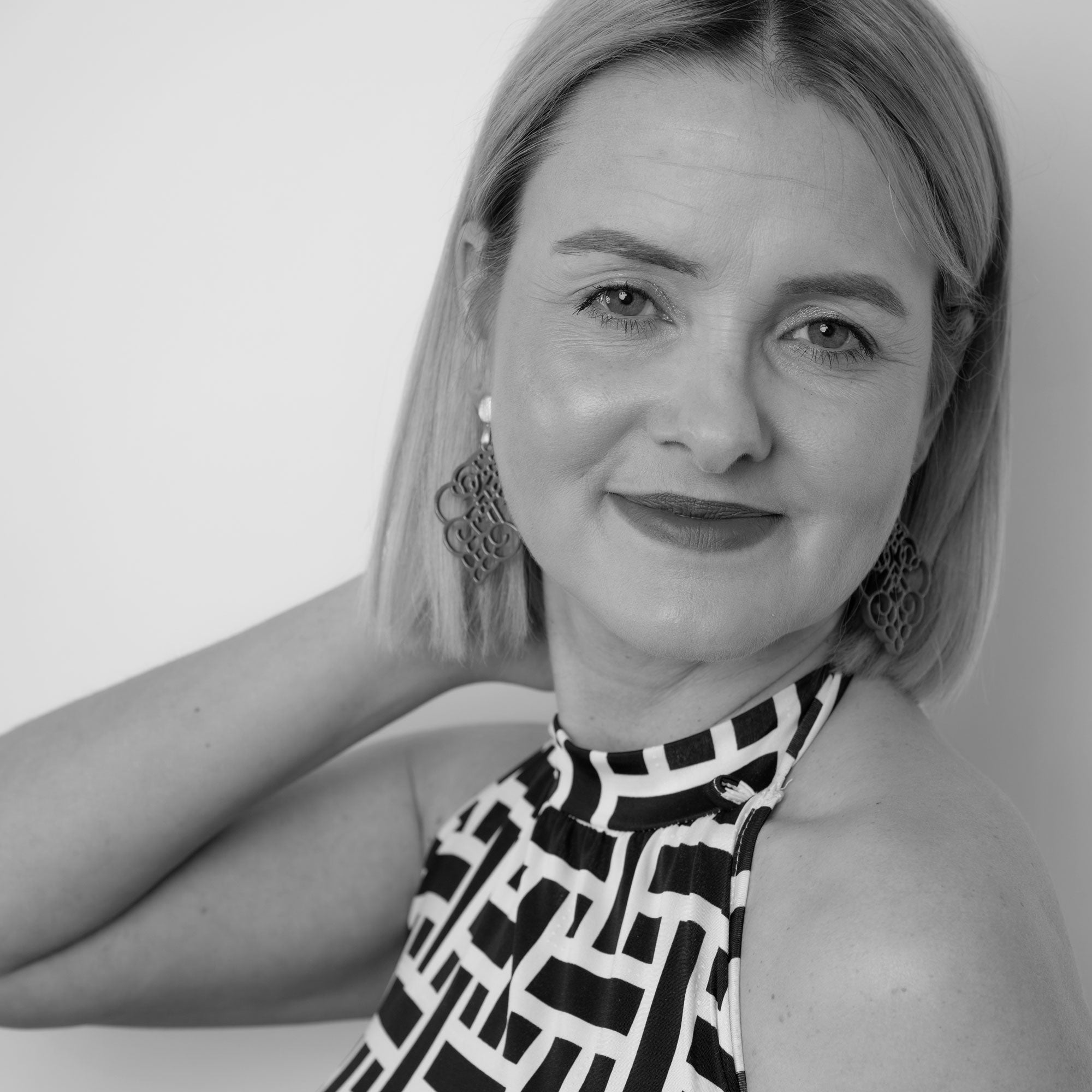 Hornohrringe elegante Lilie Braun