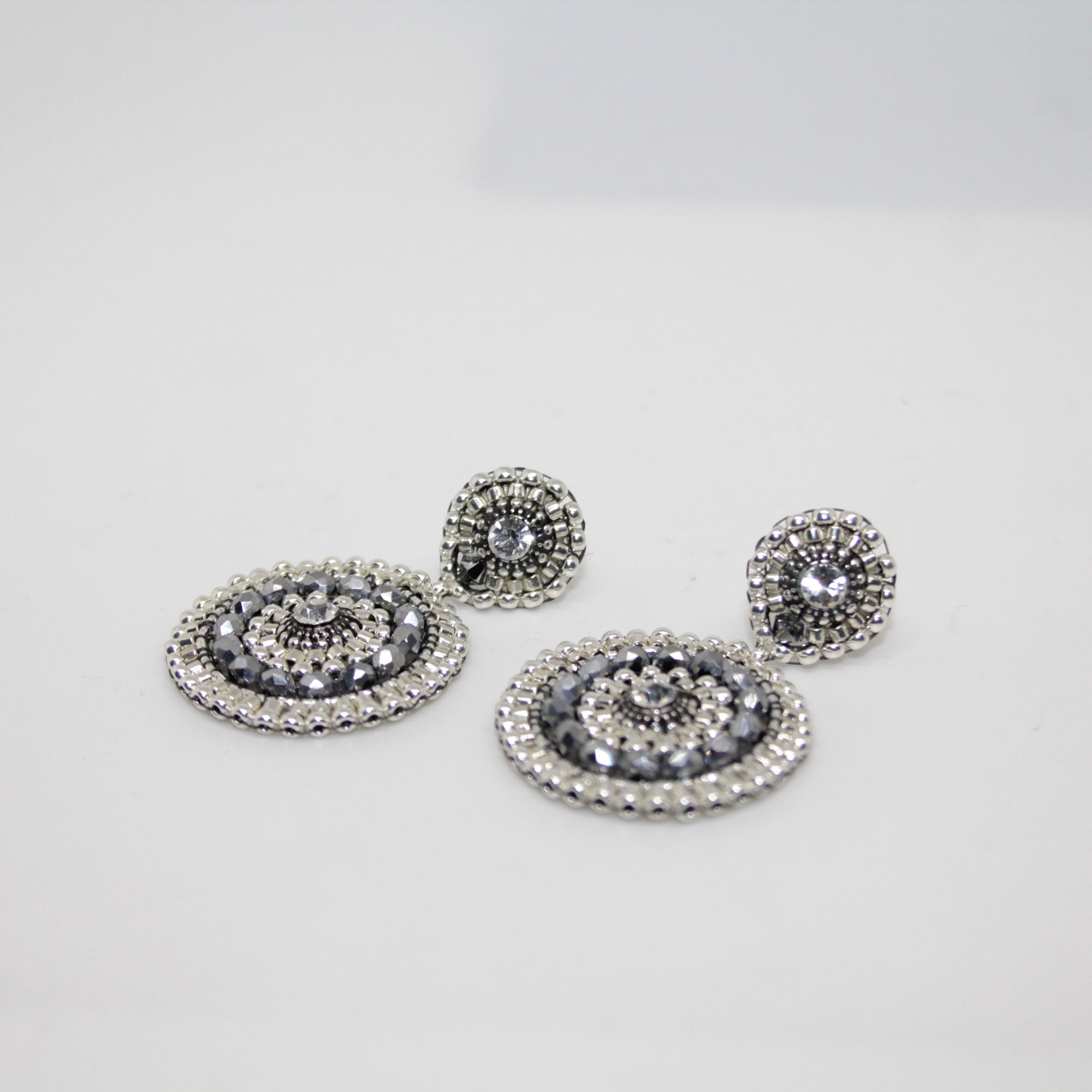 Roundup Girl Silber Ohrring handgefertigt in Österreich