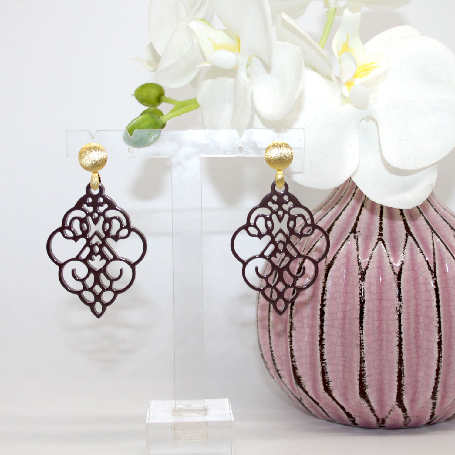 Hornohrringe elegante Lilie Braun