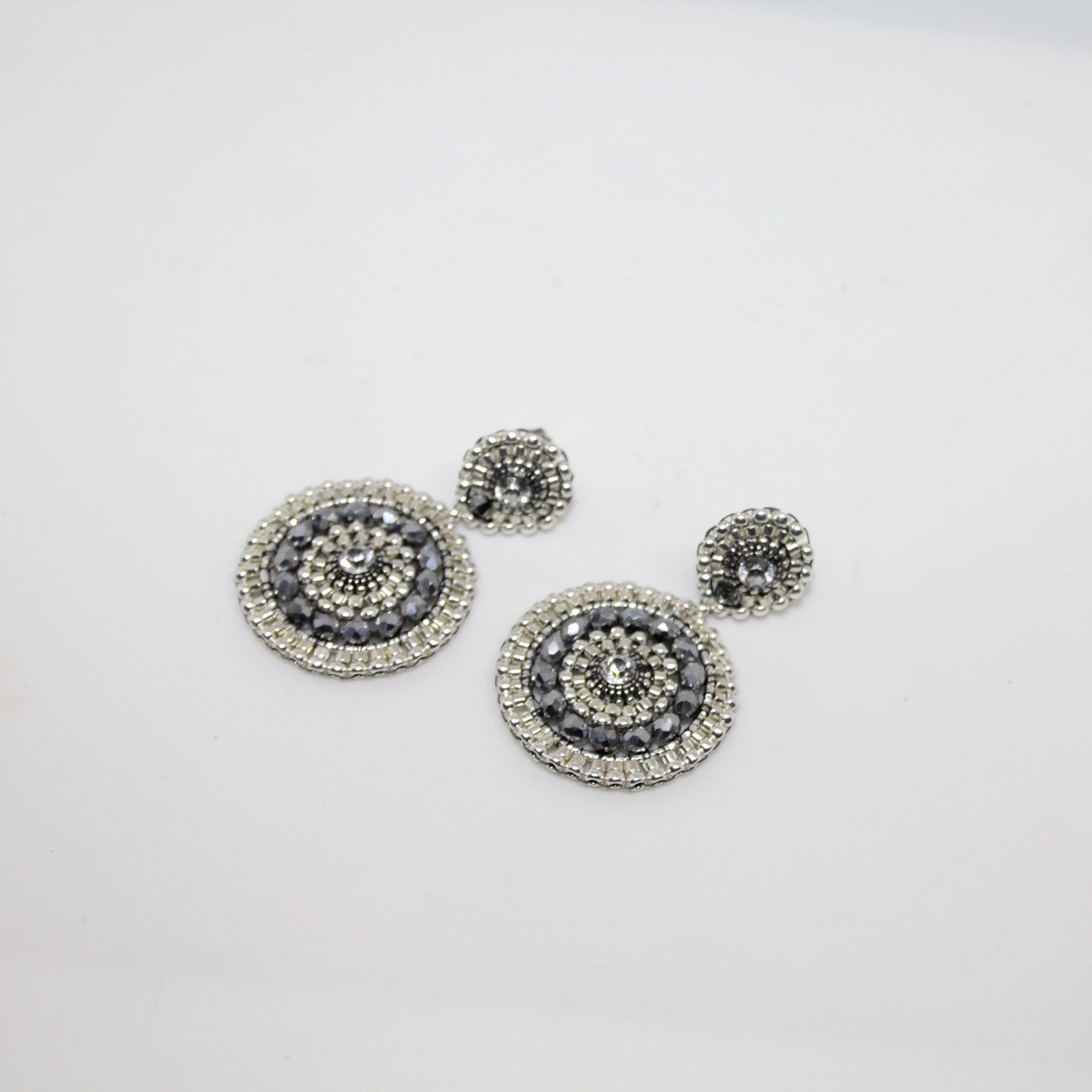 Roundup Girl Silber Ohrring handgefertigt in Österreich